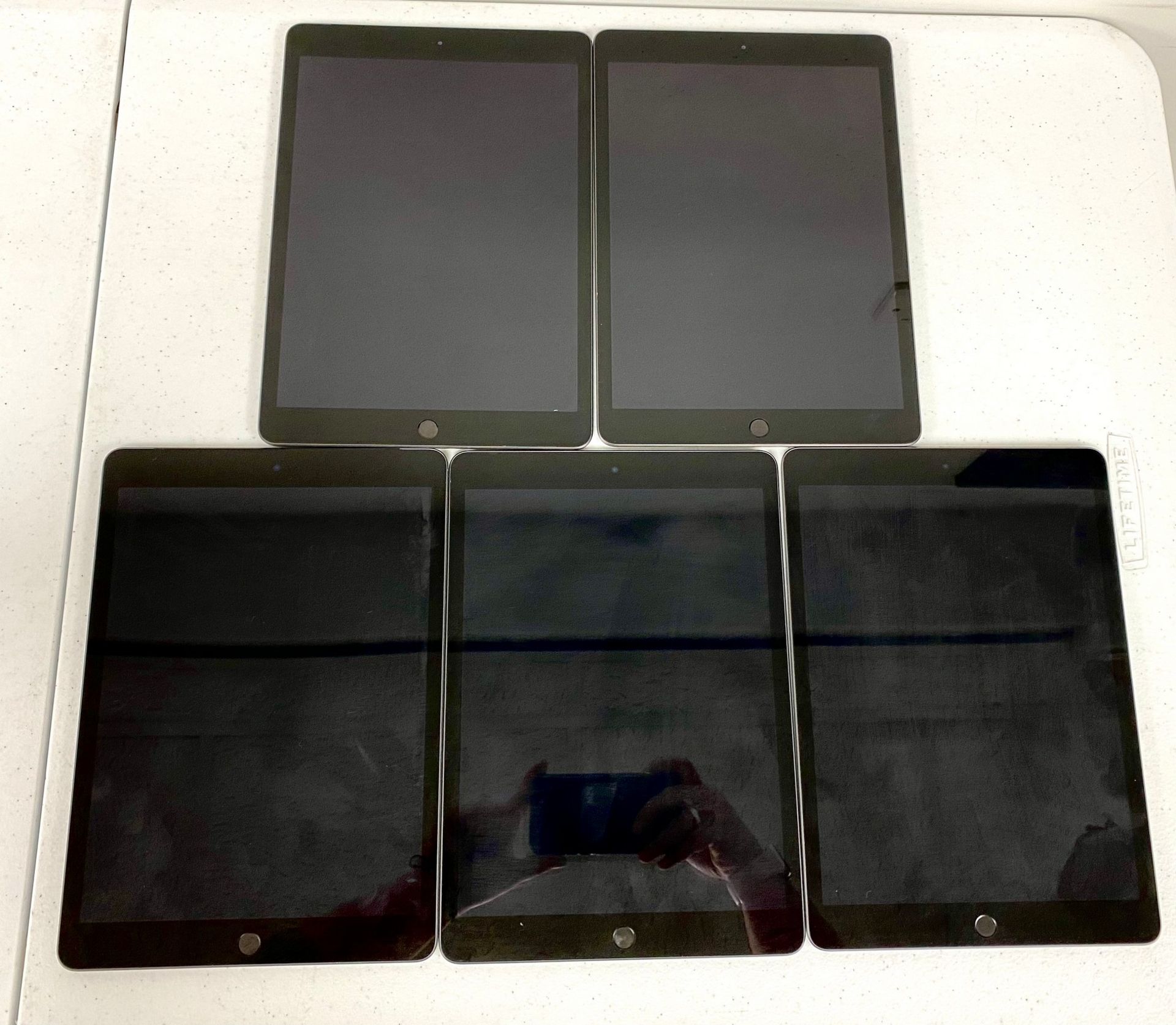 SOLD FOR PARTS: Five pre-owned Apple iPads in Space Grey; 2 x Apple iPad 10.2" 9th Gen (A2602, Wi-Fi