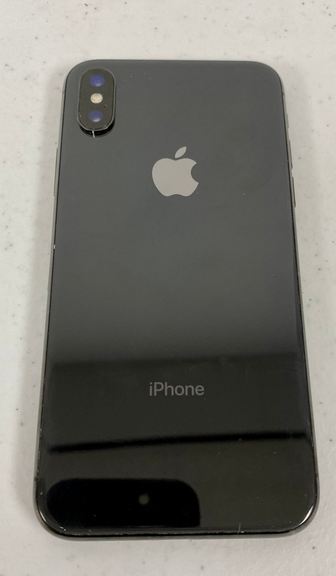 A pre-owned Apple iPhone X (AT&T/T-Mobile/Global/A1901) 64GB in Space Grey (Condition: Grade C. iClo