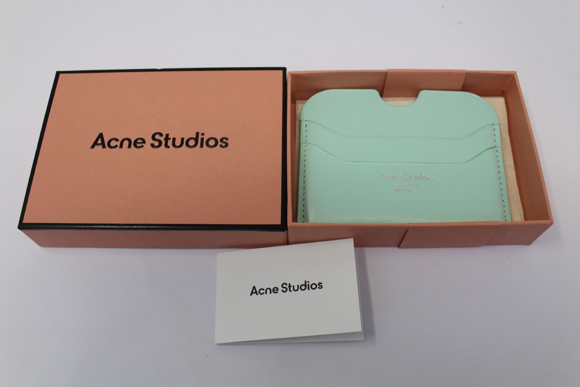 A boxed as new Acne Studios Leather Card Holder in Pastel Green.