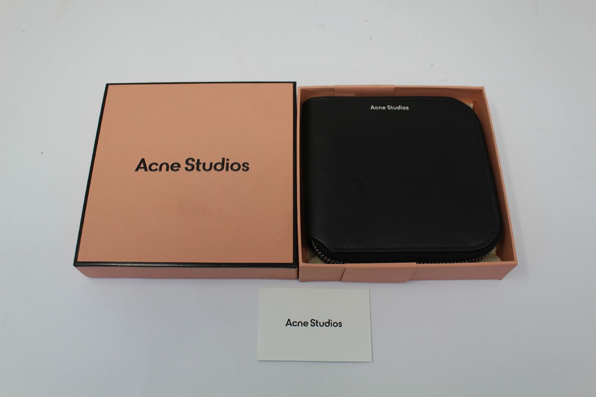 A boxed as new Acne Studio Zippered Wallet in Black.