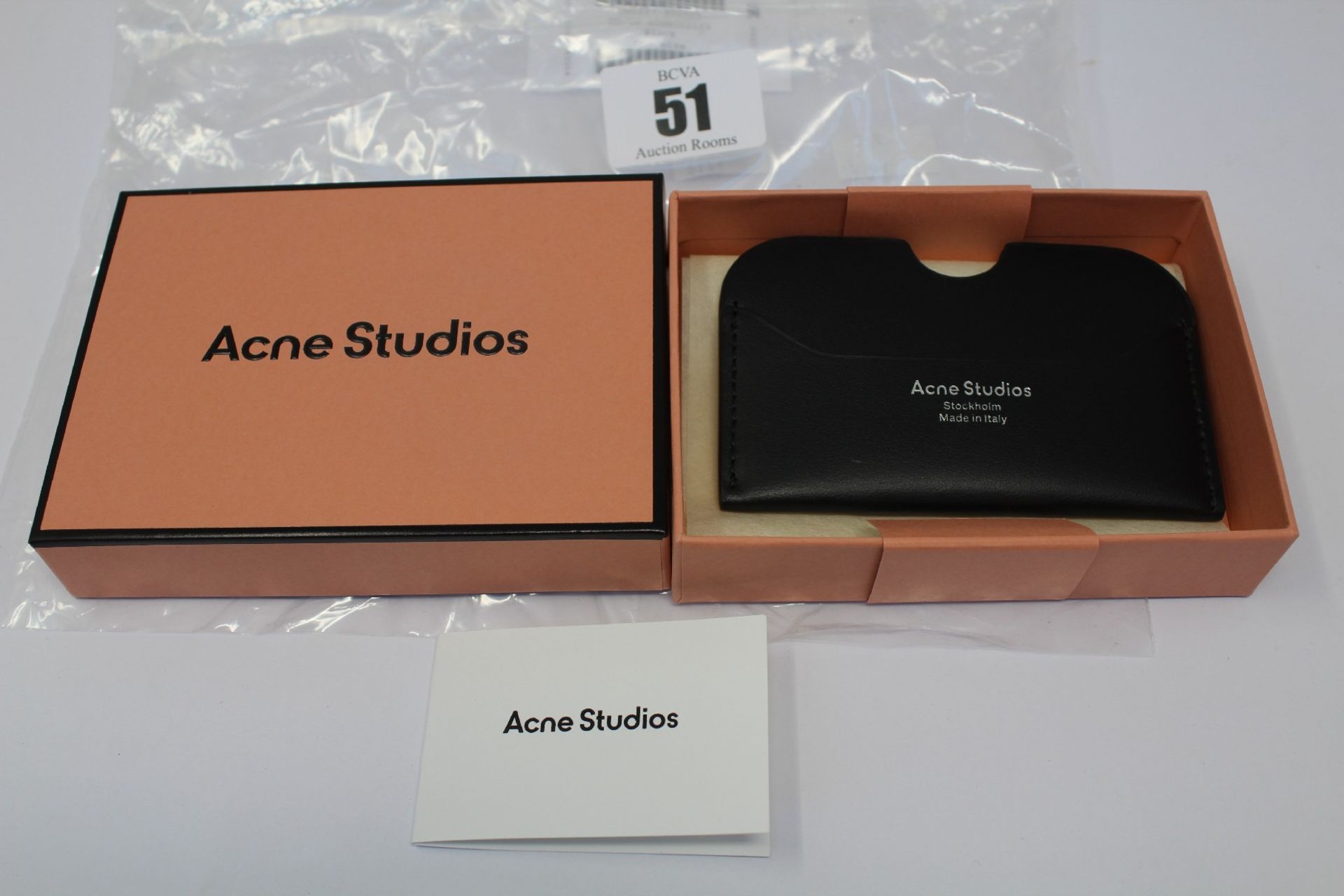 A boxed as new Acne Studios Leather Card Holder in Black.