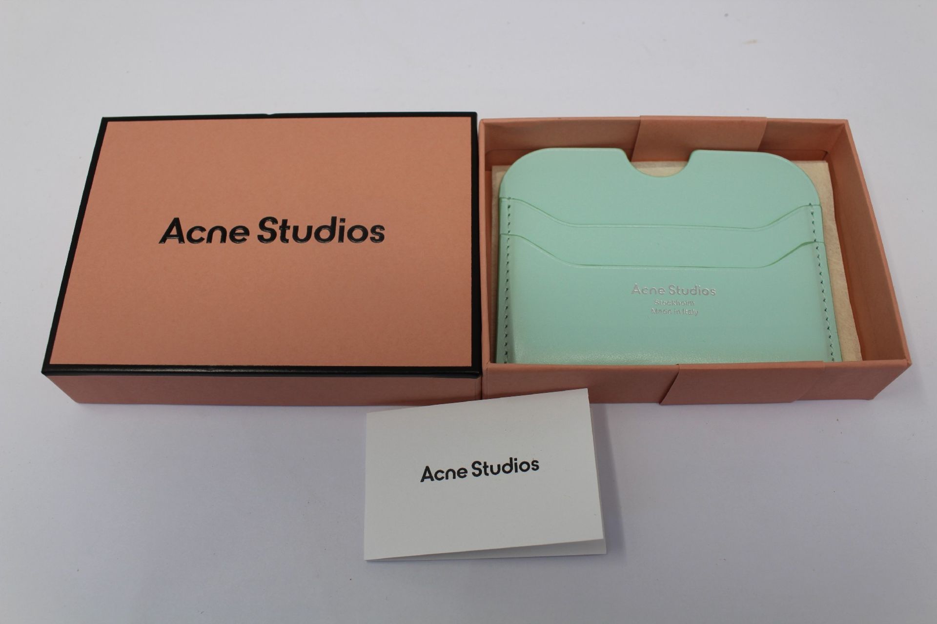 A boxed as new Acne Studios Leather Card Holder in Pastel Green.