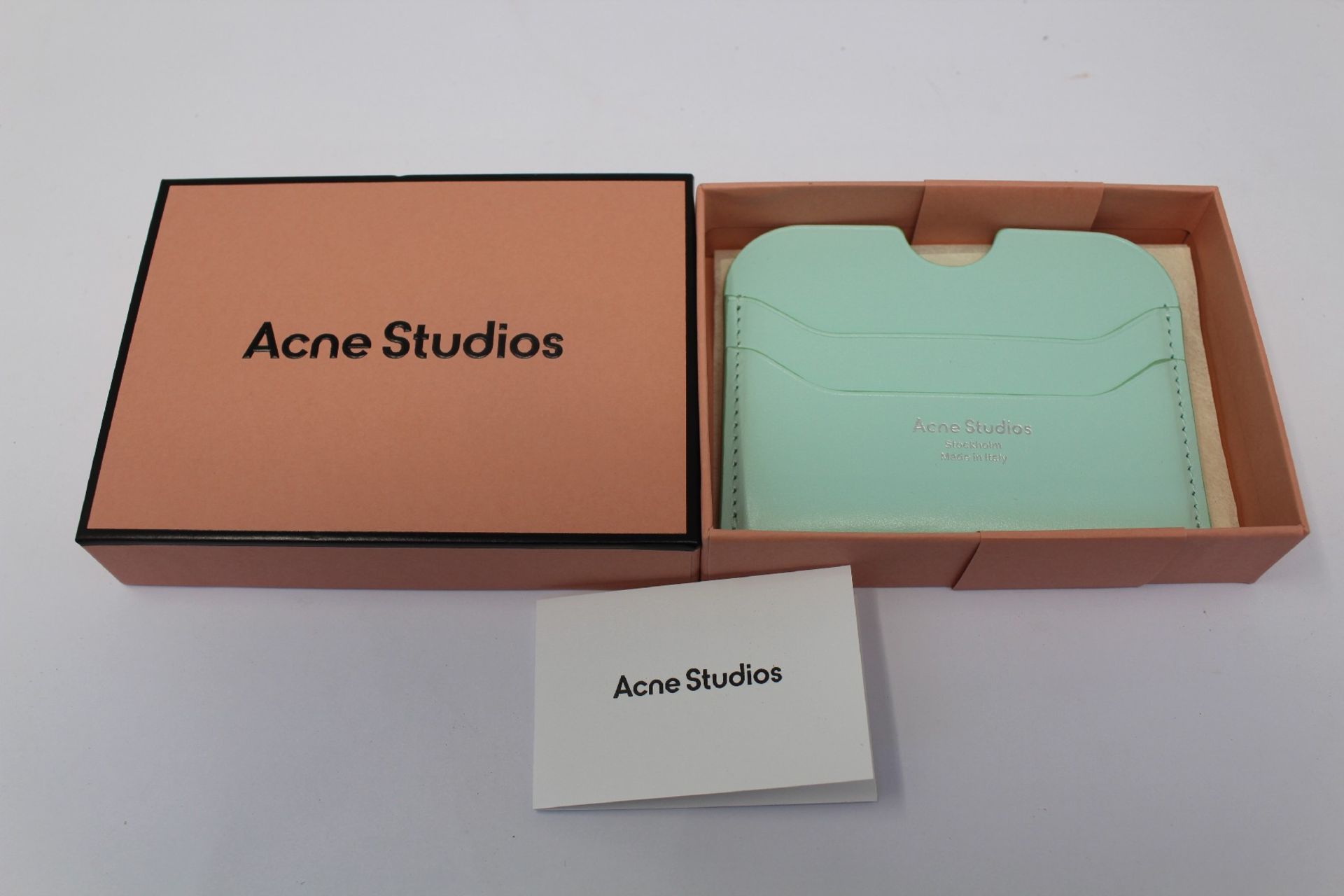 A boxed as new Acne Studios Leather Card Holder in Pastel Green.