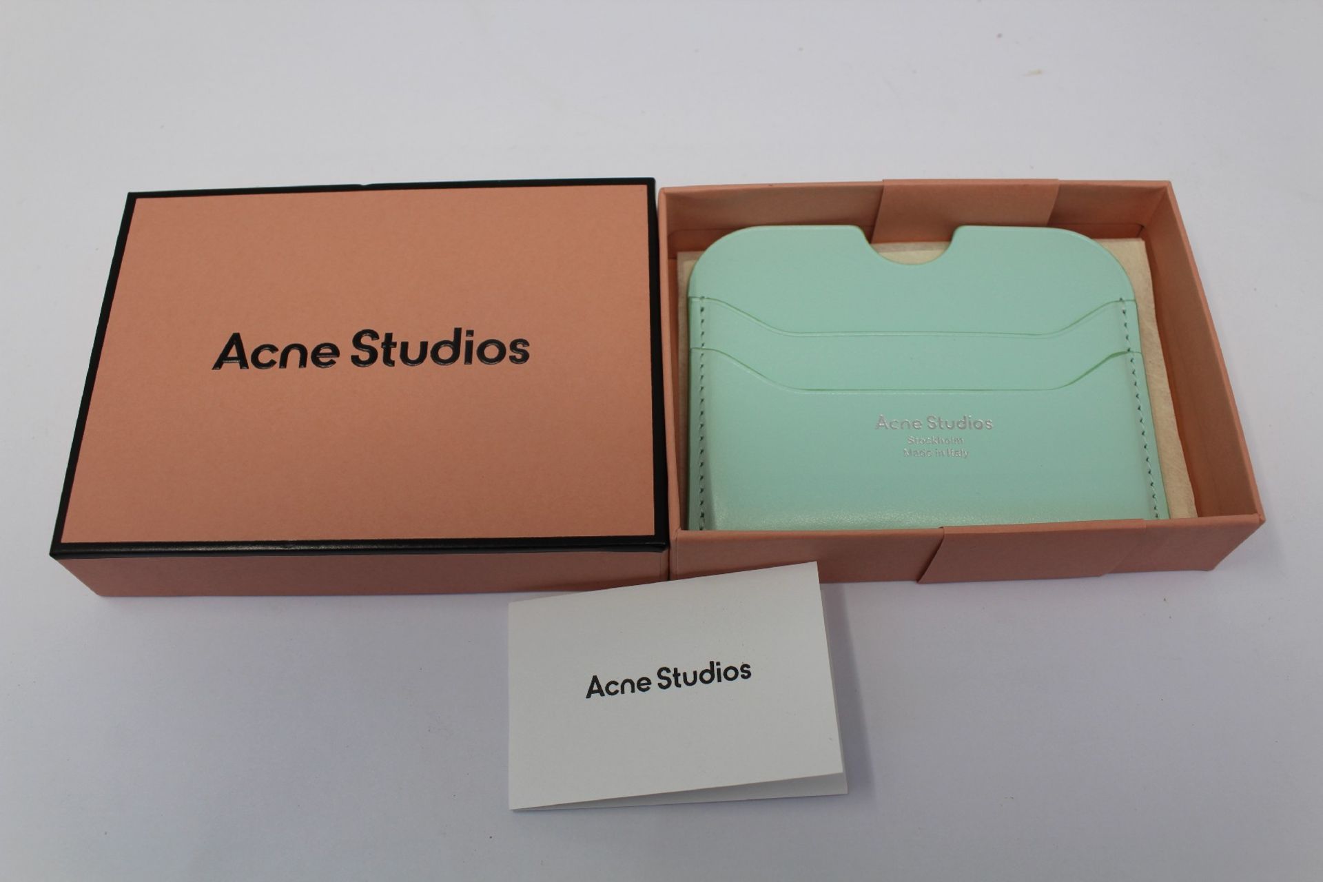 A boxed as new Acne Studios Leather Card Holder in Pastel Green.