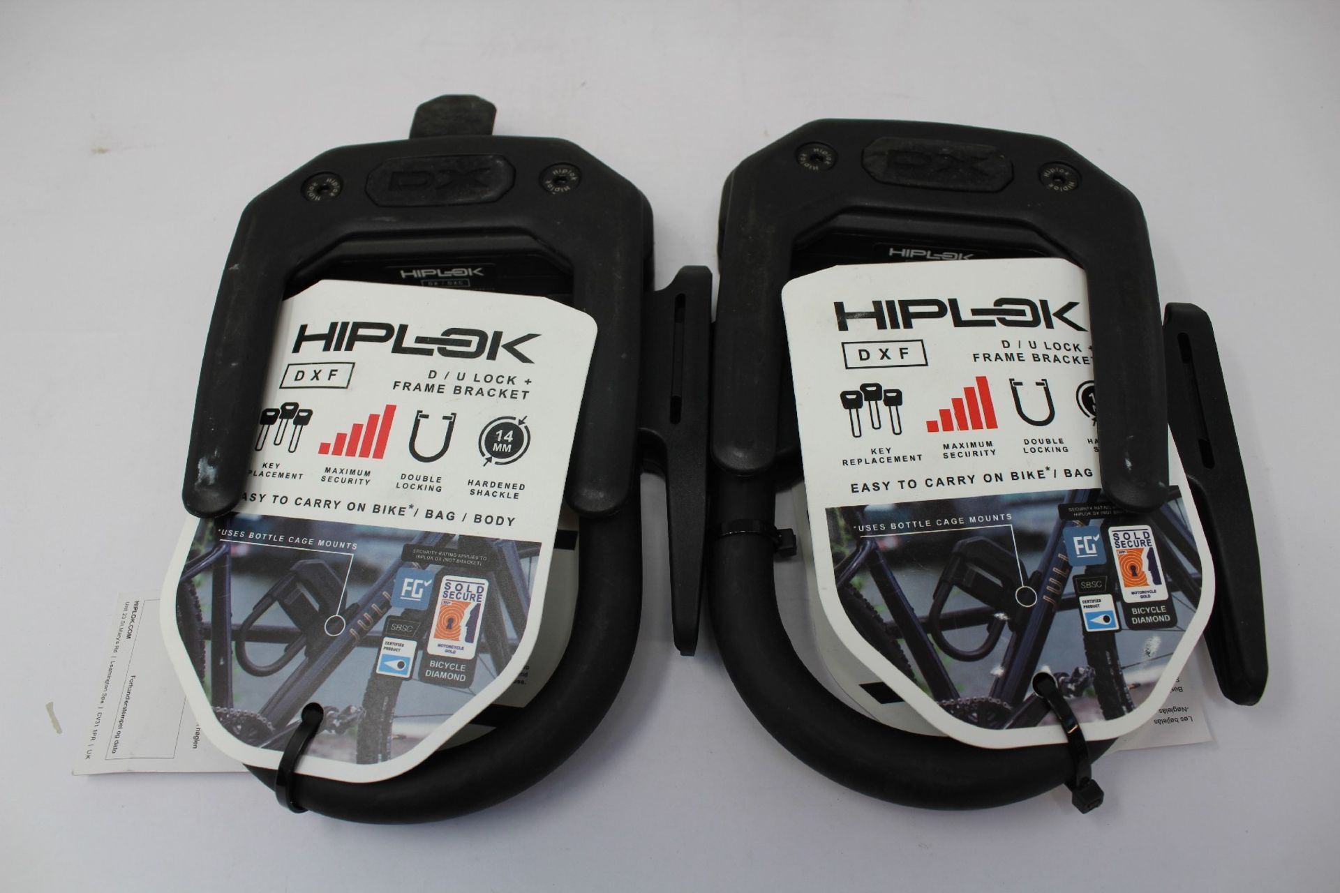 Two as new Hiplok DXF D/U Lock + Frame Brackets.