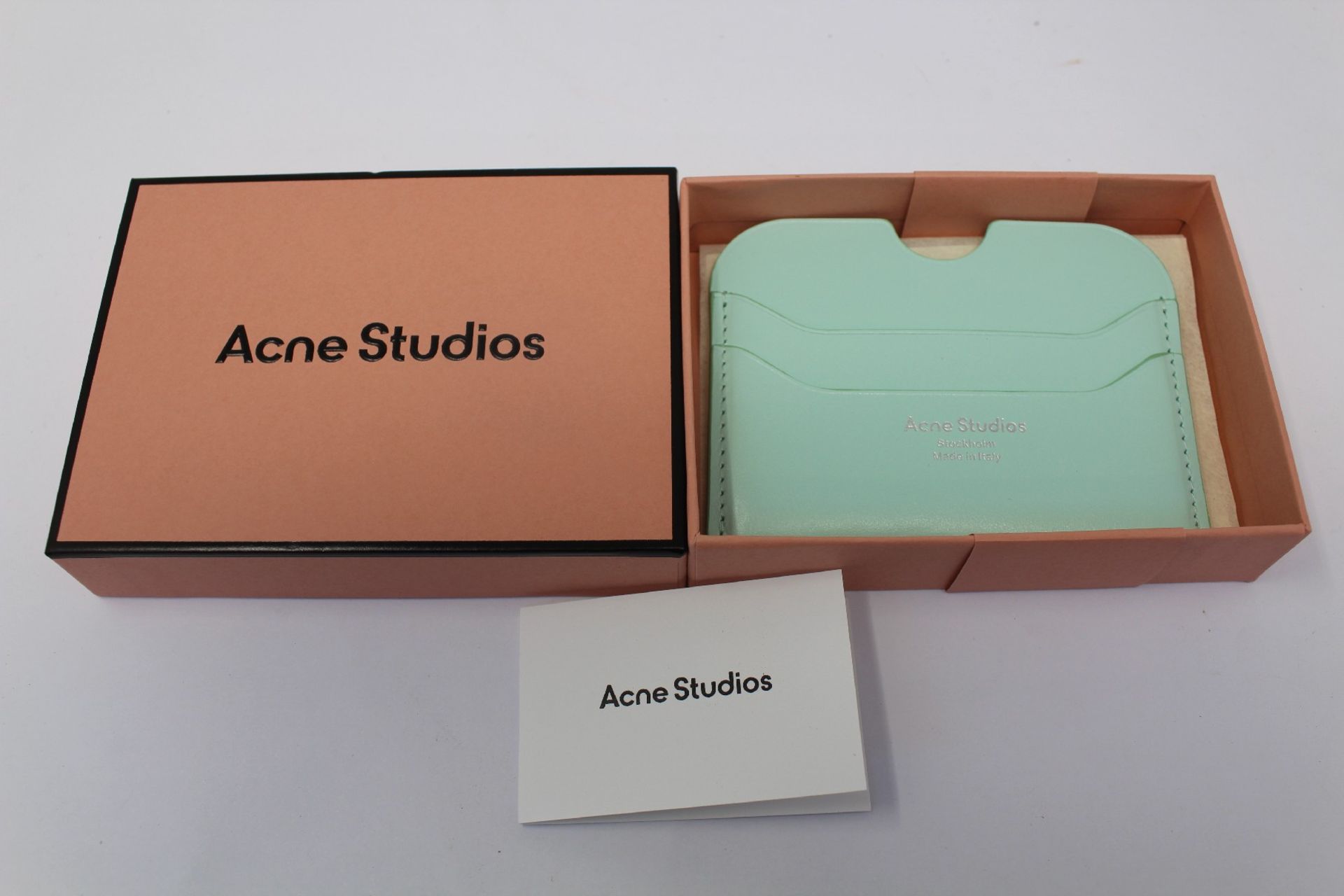 A boxed as new Acne Studios Leather Card Holder in Pastel Green.