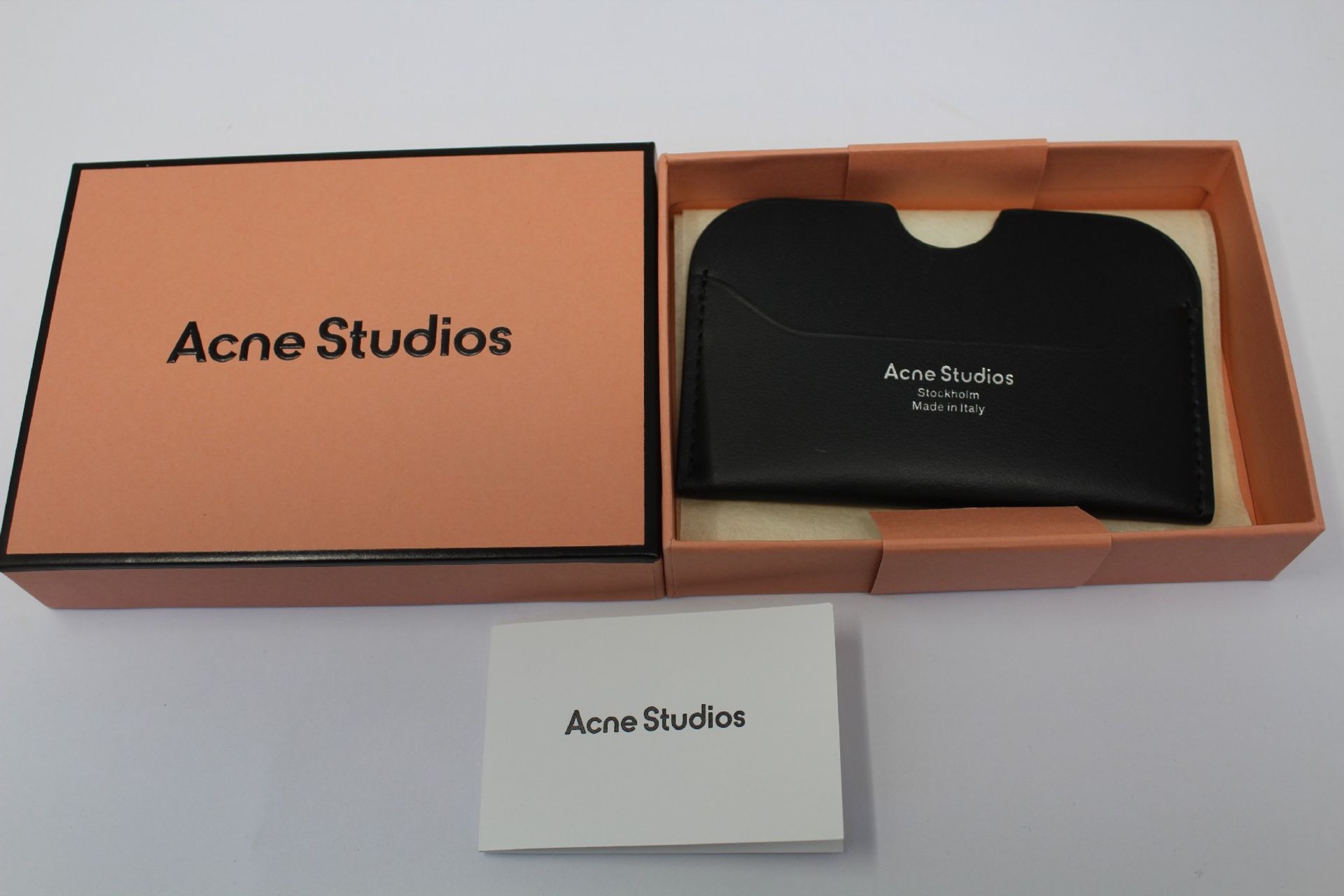 A boxed as new Acne Studios Leather Card Holder in Black.