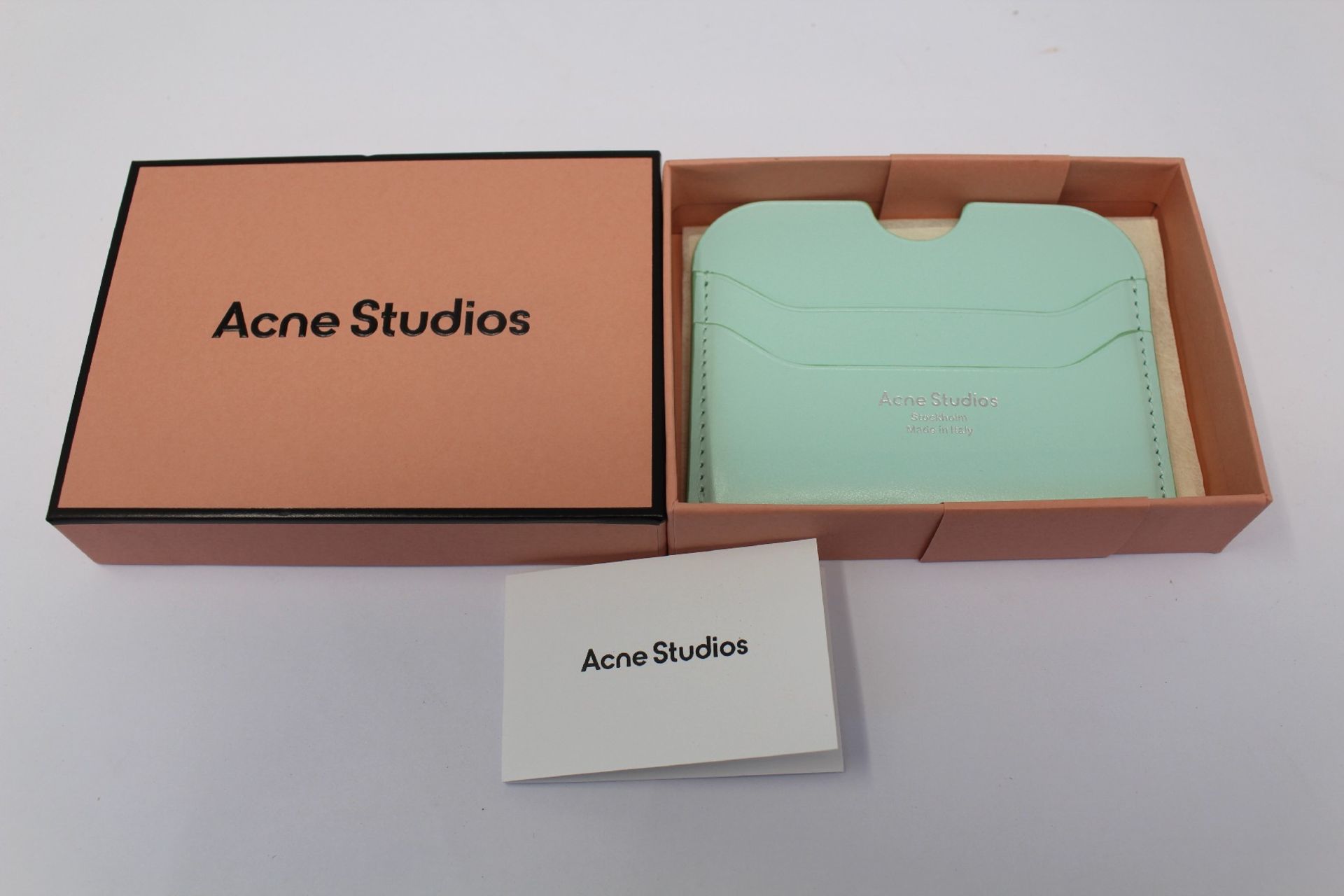 A boxed as new Acne Studios Leather Card Holder in Pastel Green.