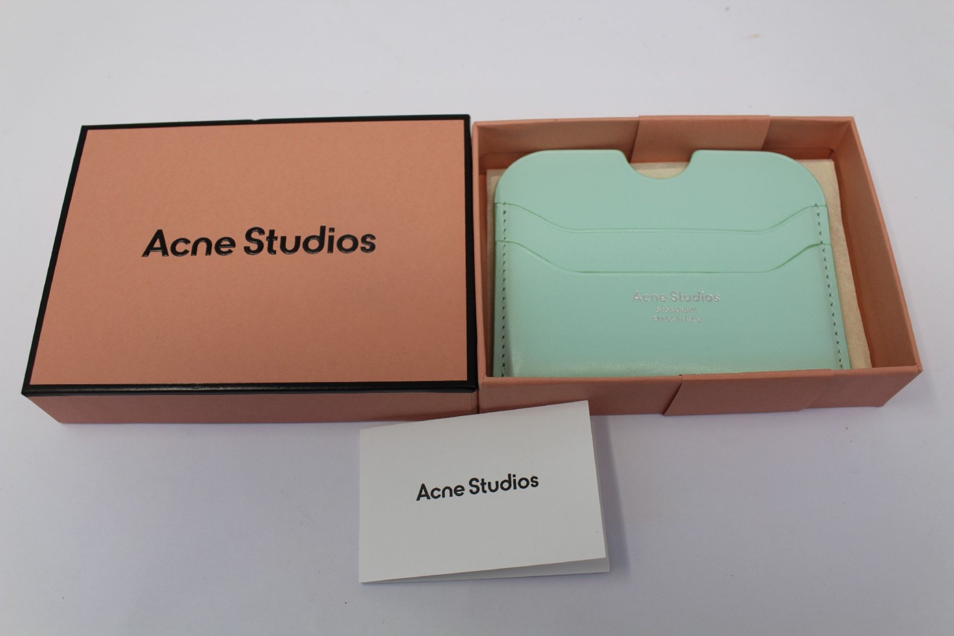 A boxed as new Acne Studios Leather Card Holder in Pastel Green.