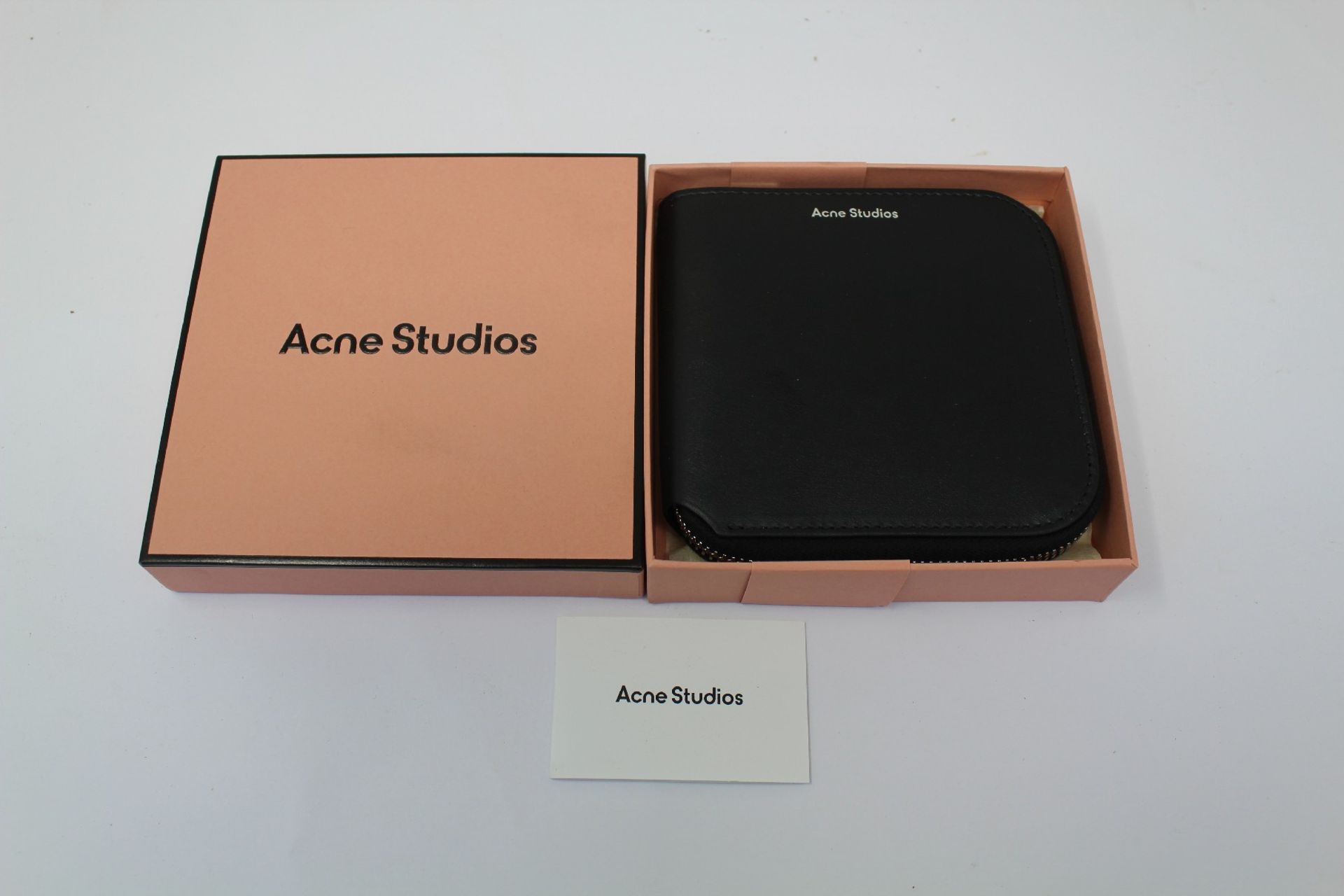 A boxed as new Acne Studio Zippered Wallet in Black.