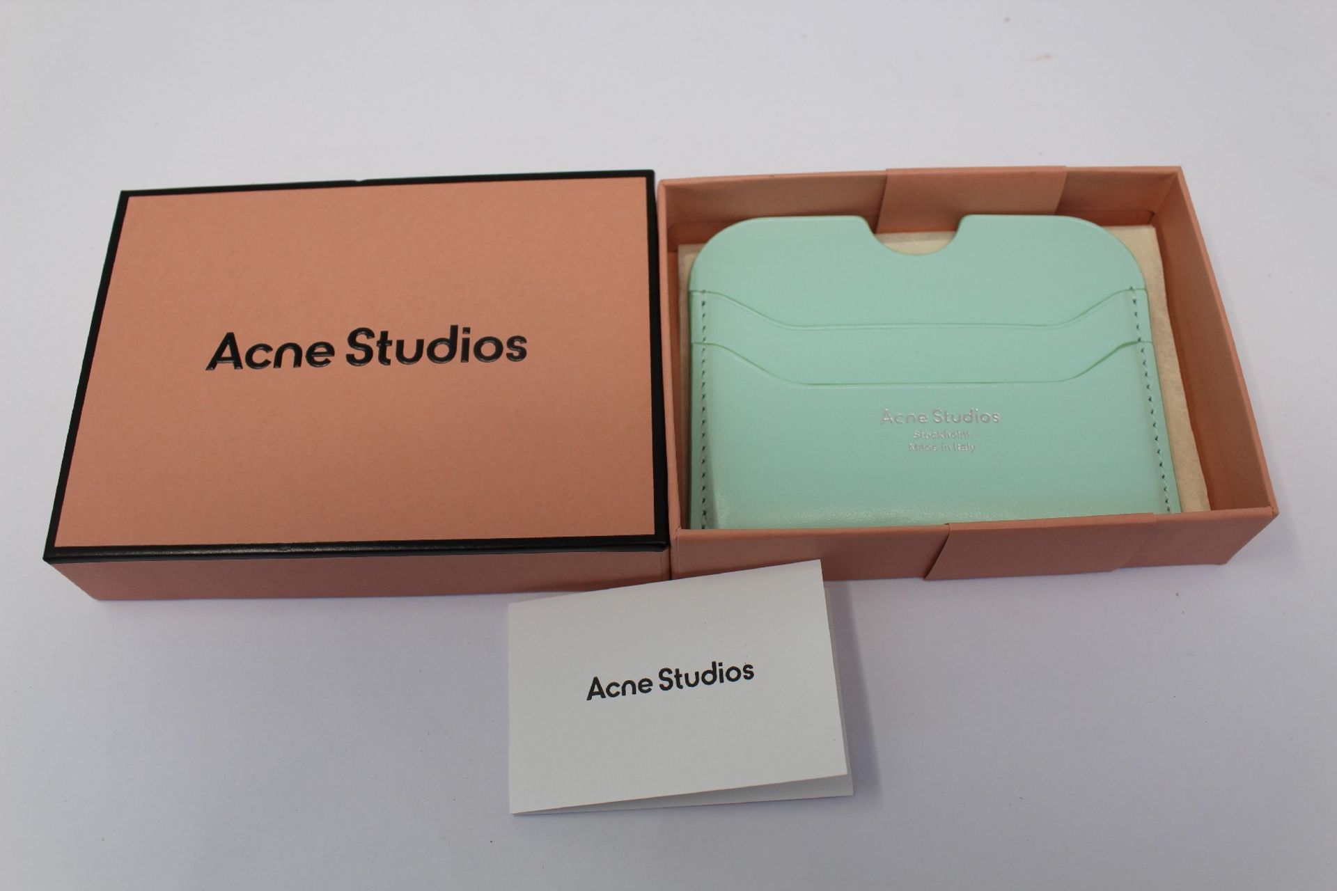 A boxed as new Acne Studios Leather Card Holder in Pastel Green.