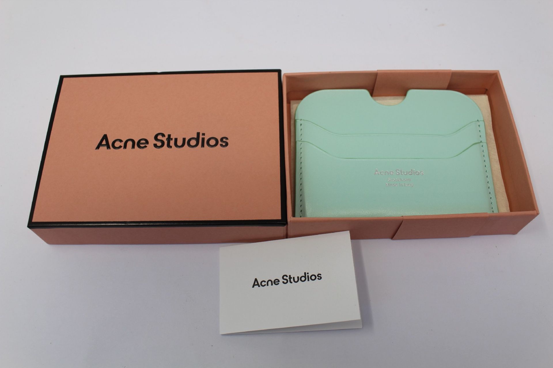 A boxed as new Acne Studios Leather Card Holder in Pastel Green.