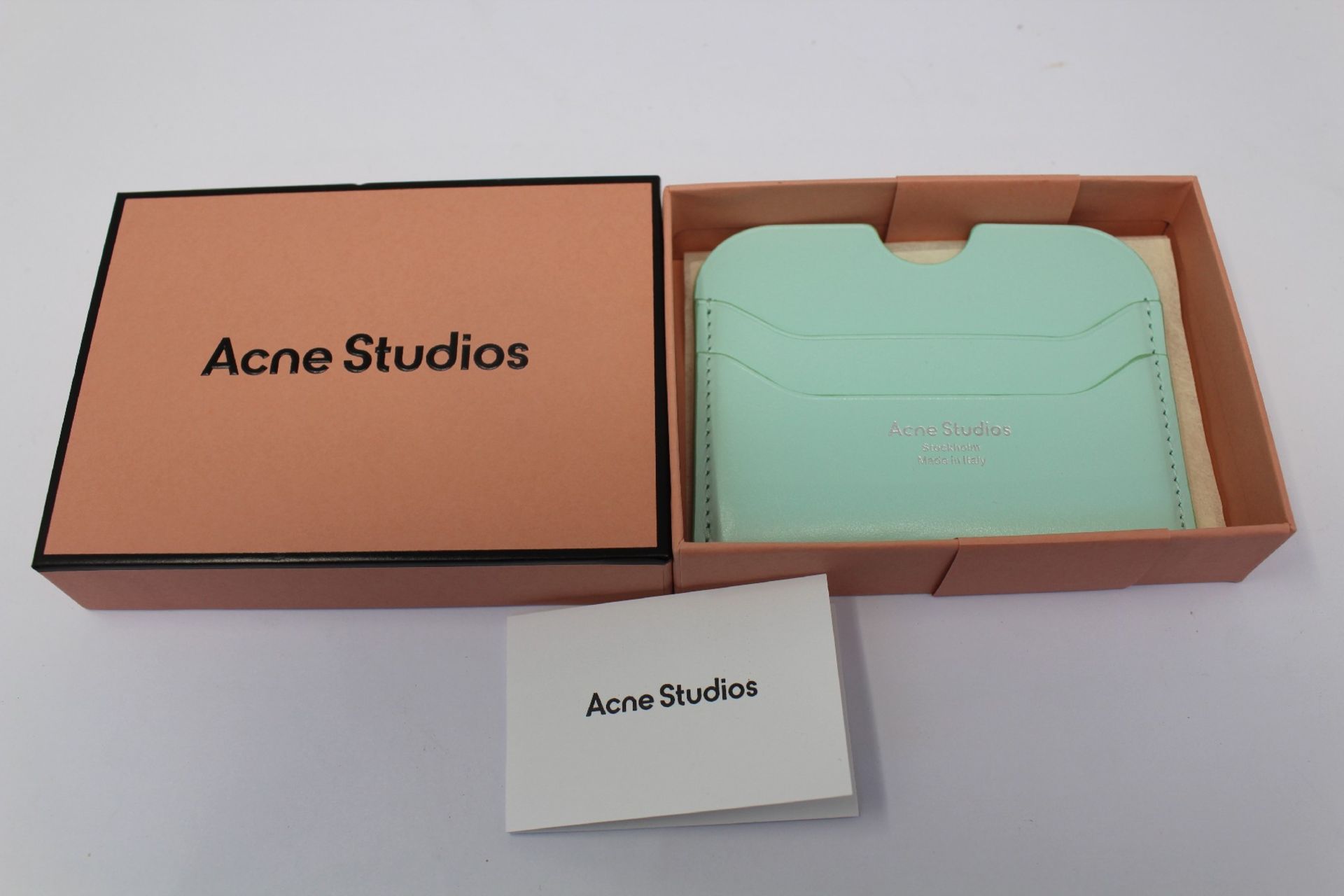 A boxed as new Acne Studios Leather Card Holder in Pastel Green.