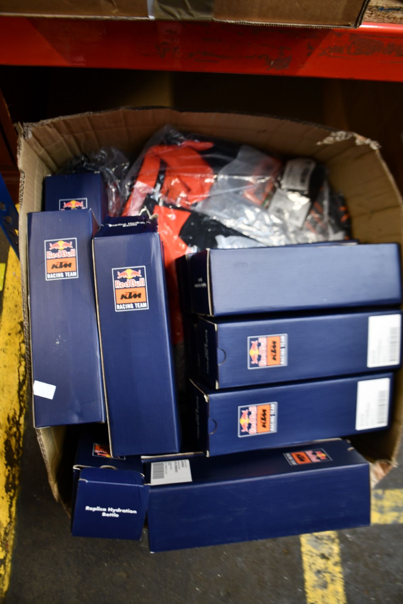 A quantity of KTM Team Polo's and Replica KTM Red Bull Team Tee's (Approximately 25 items, various