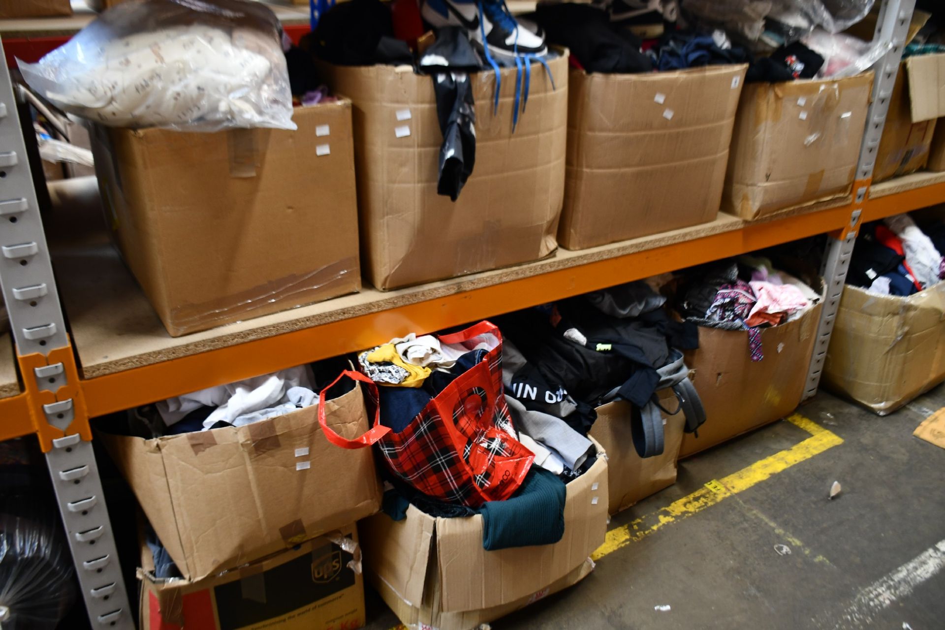 A large quantity of pre-owned clothing and related.