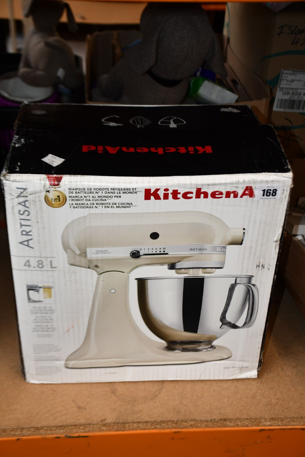 A pre-owned KitchenAid Artisan 4.8L Mixer in Almond Creme (UK Plug) (NOTE: Item is untested, viewing