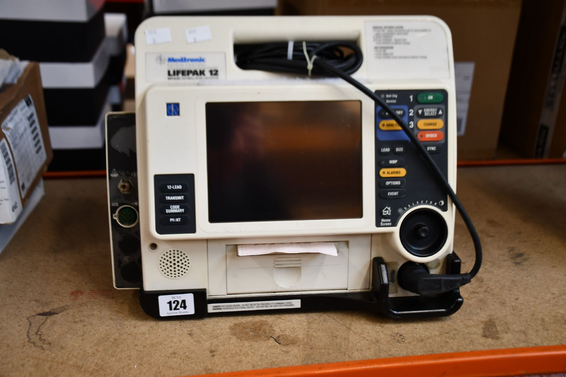 A pre-owned Medtronic Lifepak 12 ECG machine (Batteries not included) (Untested, viewing advised).