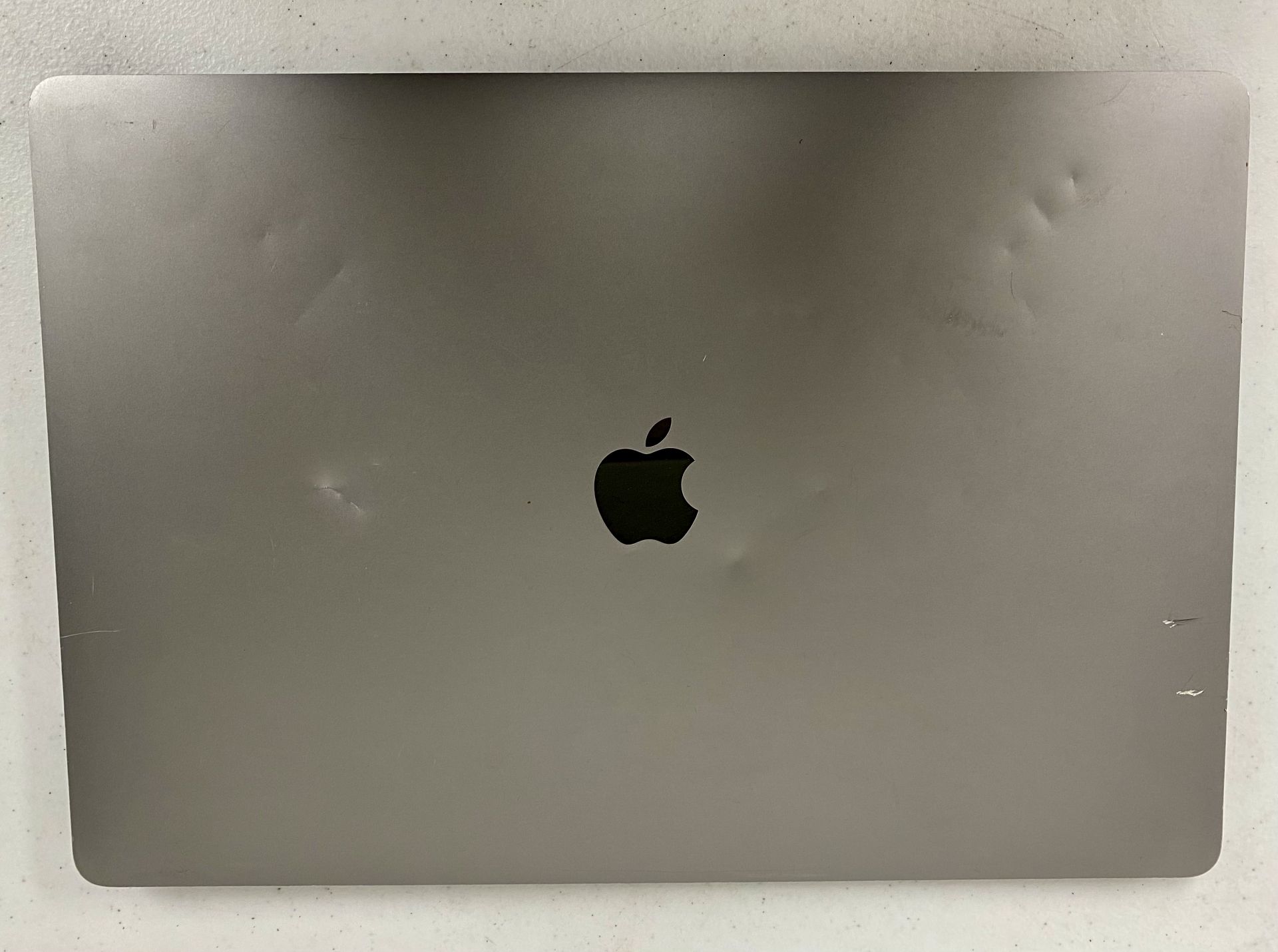 SOLD FOR SPARES OR REPAIR: A pre-owned Apple MacBook Pro (2019, Touch Bar) 16" in Space Grey with In
