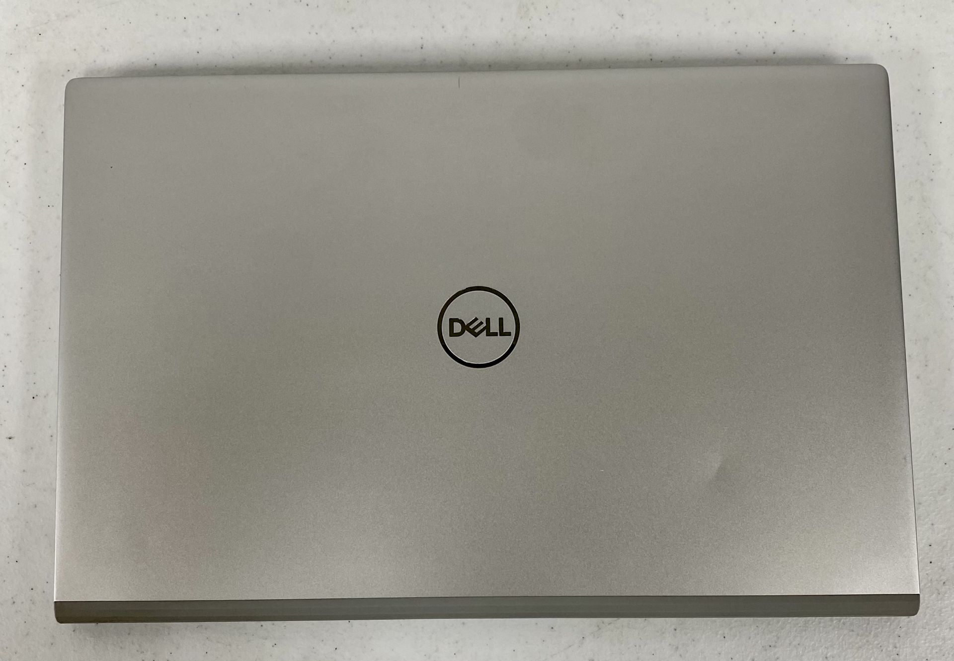 A pre-owned Dell Inspiron 15 5000 Laptop in Silver with Intel Core i5-1135G7 2.40GHz CPU, 8GB RAM, 2