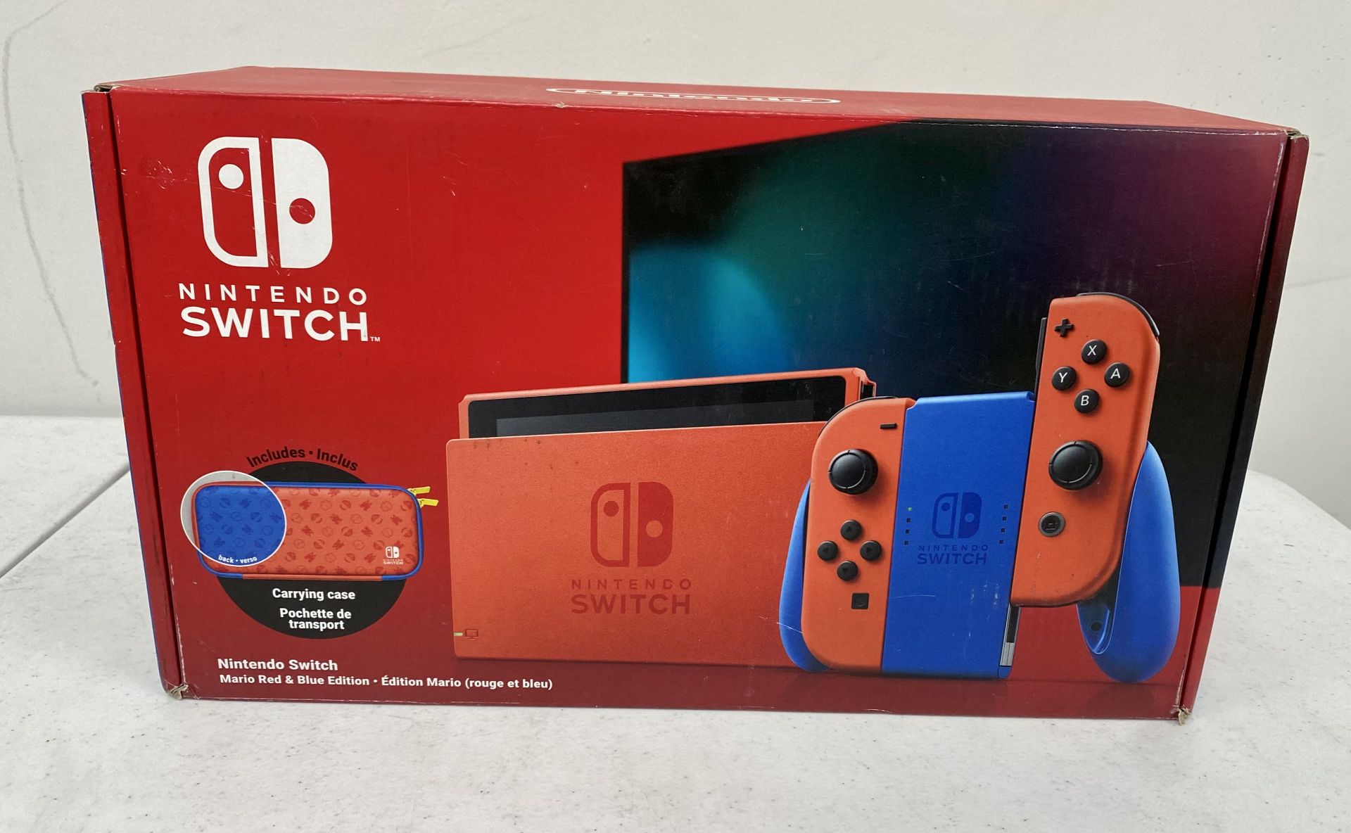 A boxed as new Nintendo Switch Mario Red & Blue Edition Console (P/N: HAD-S-RAAAF(EUR) EAN: 04549645