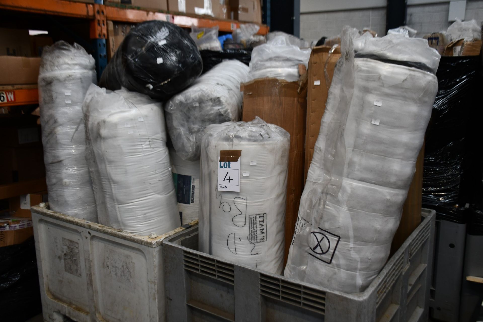 A large quantity of rolled mattresses in various sizes (Stillage's not included).