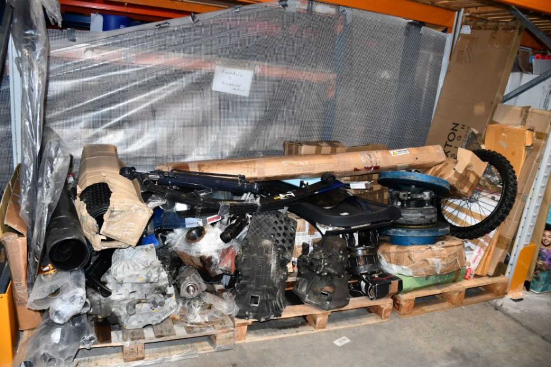 Three pallets of automotive parts and related items