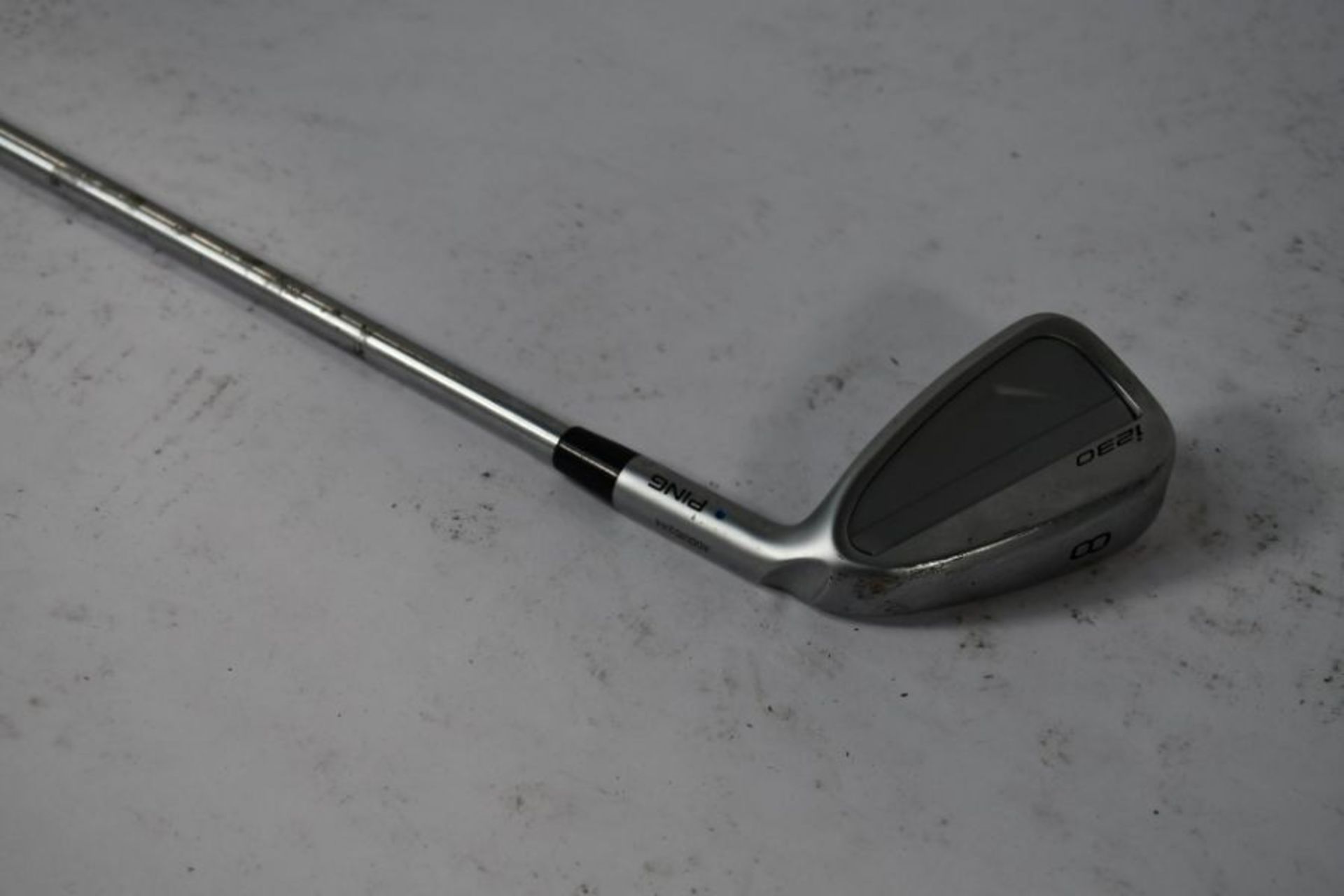 A pre-owned Ping i230 golf club (8 iron)