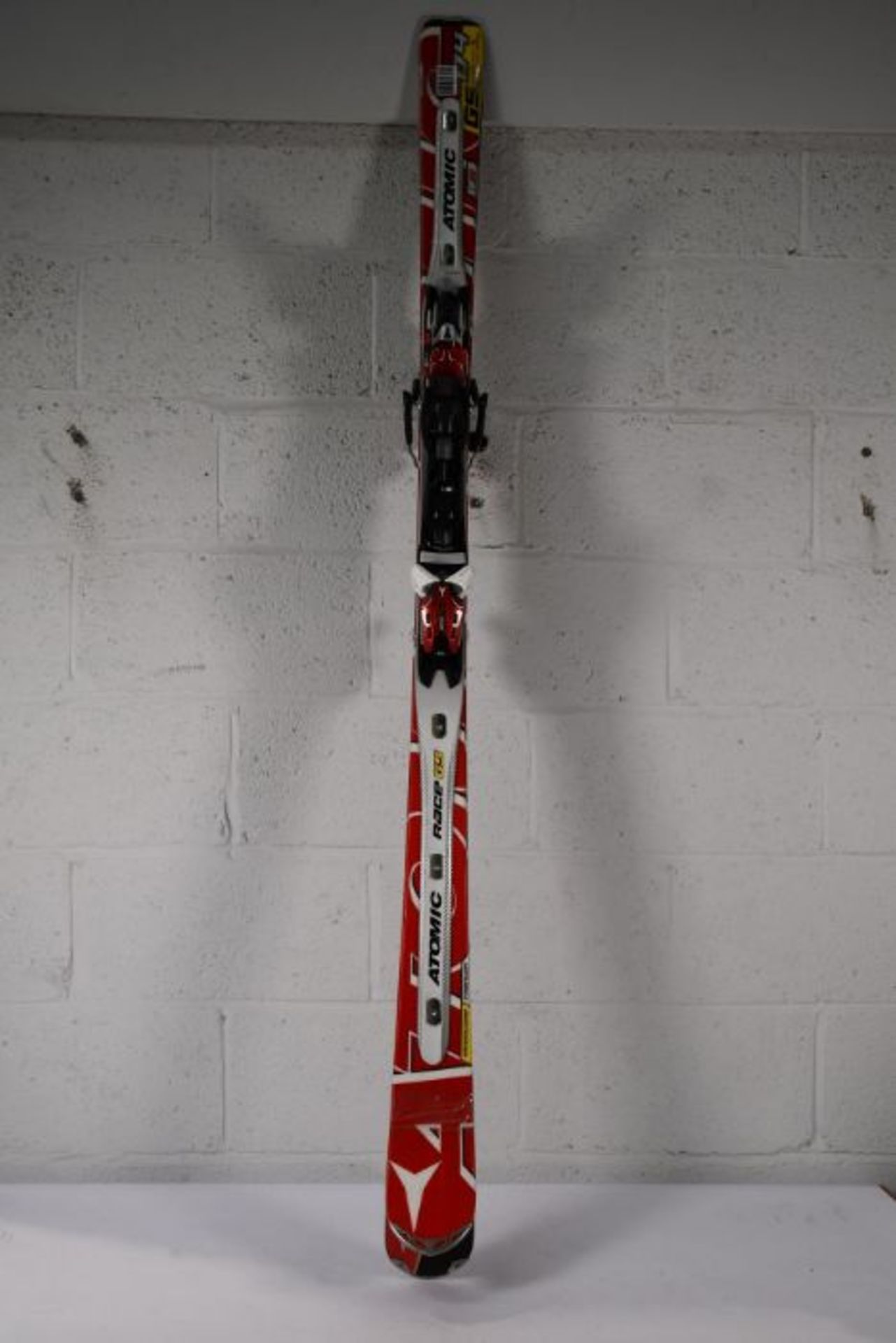 A pair of pre-owned Atomic Redster FIS Doubledeck GS 171cm Youth Skis and X12 VAR Bindings