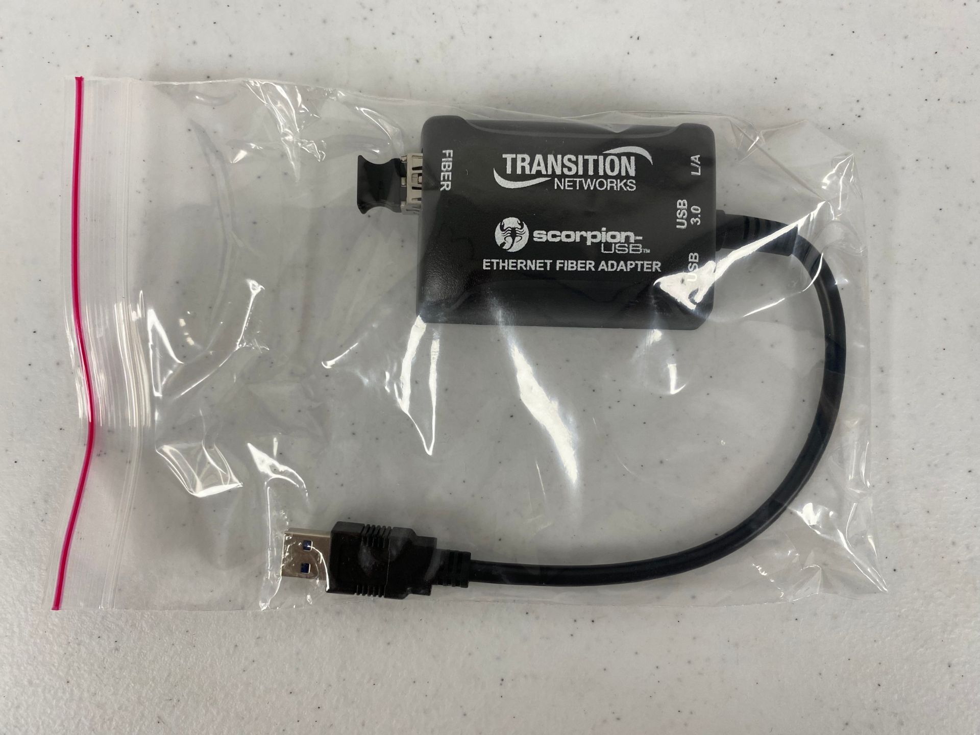 A boxed as new Transition Networks TN-USB3-SX-01(LC) Scorpion-USB 3.0 Gigabit Ethernet Fibre Adapter