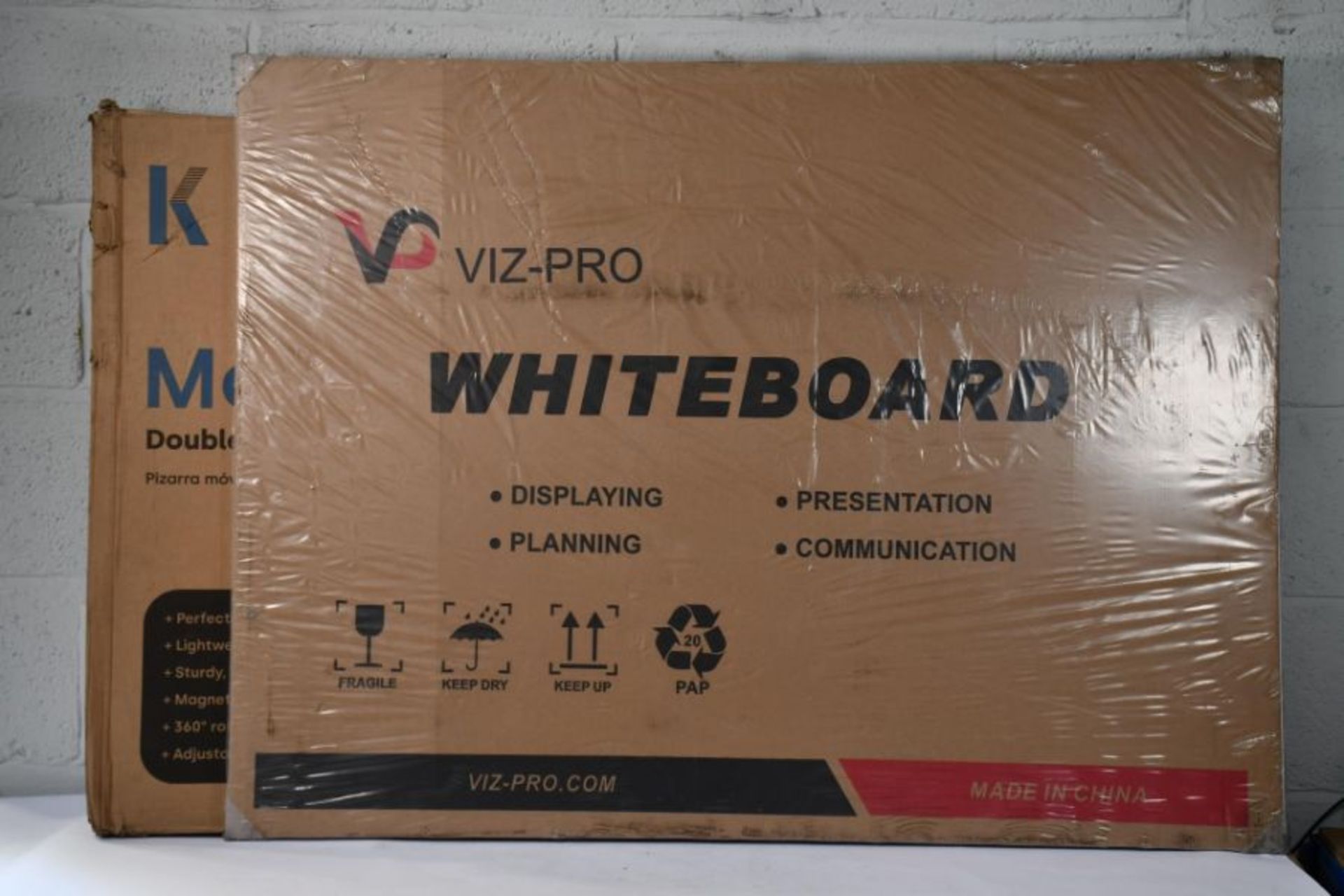 A Dry Wipe Magnetic Whiteboard 120 x 90cm and a Mobile Writing Board 116 x 80cm