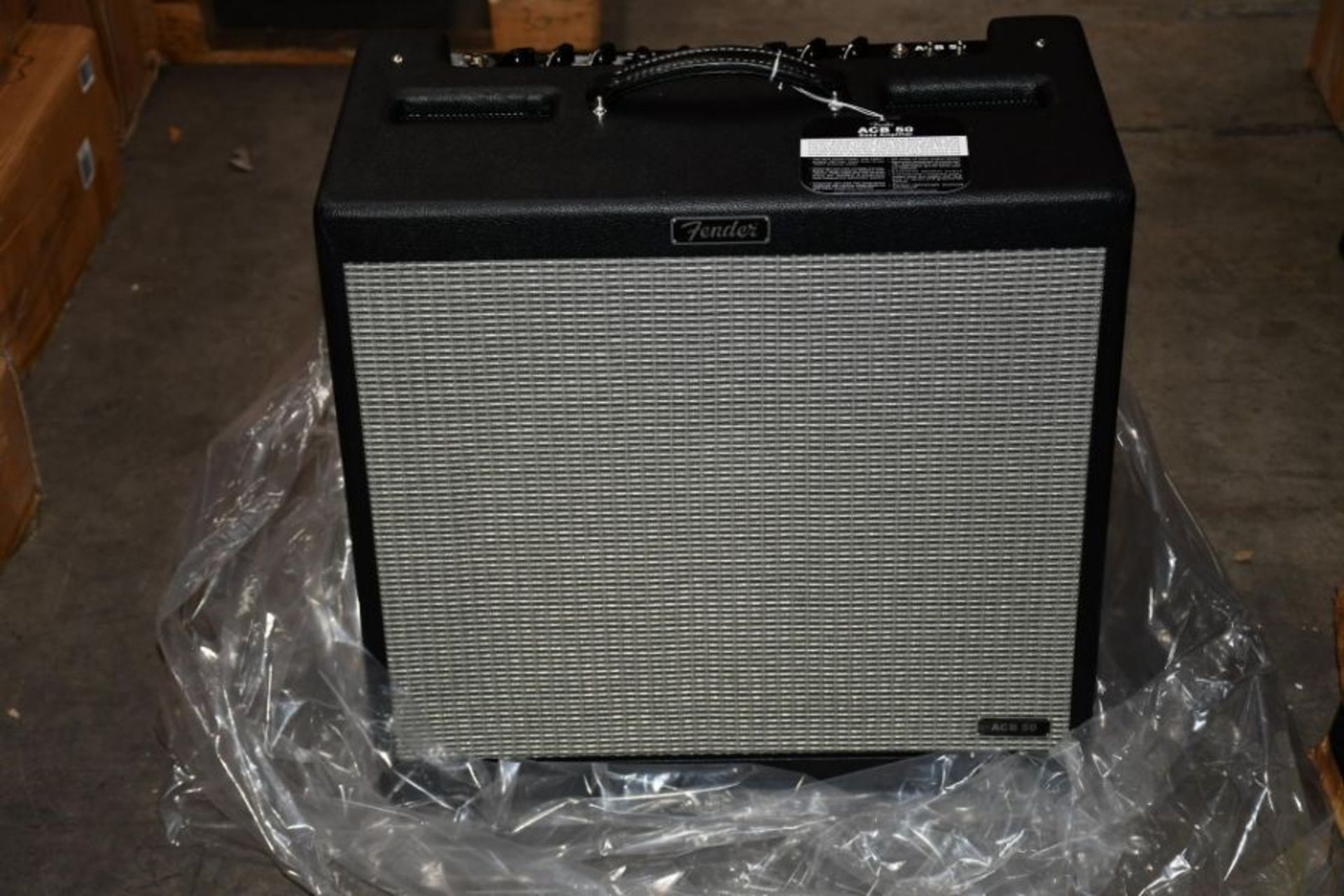 A boxed as new Fender ACB 50 Bass Amplifier