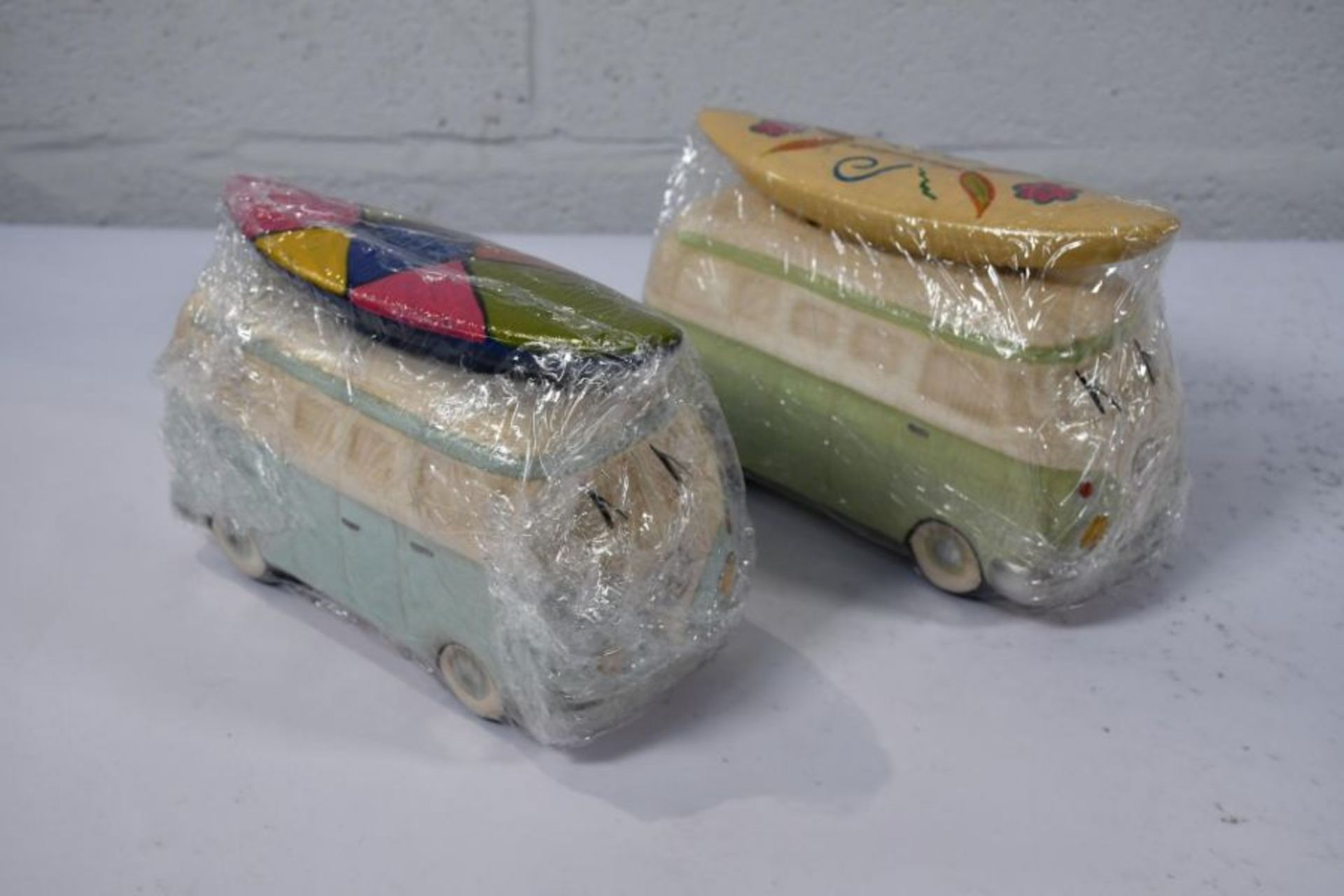Thirty as new Ceramic Camper Van Money Boxes in various colours.