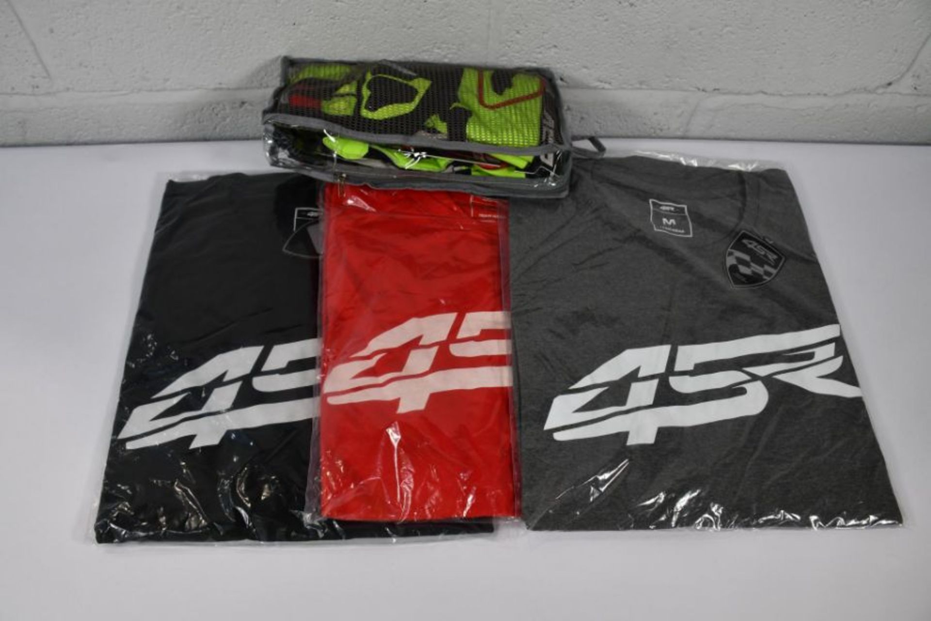 A quantity of as new 4SR racing wear to include t-shirts, a hoodie, base tops and gloves (all Medium