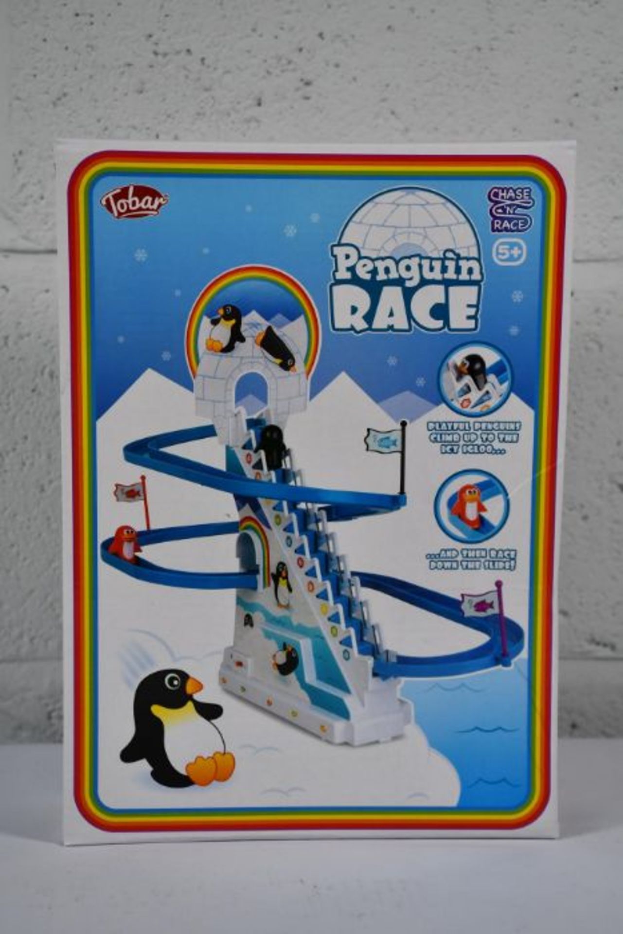 Six boxed as new Tobar Penguin Race Games.