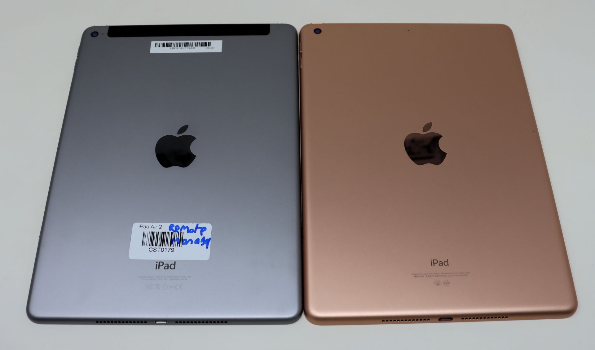 SOLD FOR PARTS: A pre-owned Apple iPad 9.7" 6th Gen (Wi-Fi Only) (iCloud Activation locked) and a pr