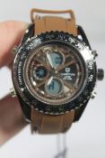 An as new Martyn Line Multi-Function Chronograph Water Resistant 30M Watch with Brown-Black Rubber S