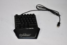 Ten black Lexon Tech one handed gaming keyboards with rainbow back lights.