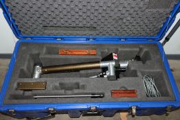 A pre-owned Faro Gold Measuring Arm with accessories in a wheeled flight case (Case missing one cast
