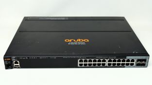 A pre-owned Aruba HPE 2920-24G 24 Port Switch (P/N: J9726A).