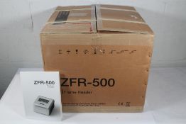 An as new Huvitz Carl Zeiss ZFR-500 Frame Reader, requires a UK power adapter.