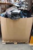 A pallet of pre-owned clothing and related items.