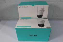 Three Netvue Sentry 2 Outdoor Wi-Fi Security Cameras.