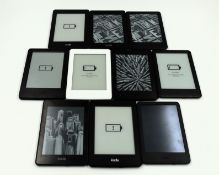 Ten pre-owned Amazon Kindle E-Readers (Assorted models and conditions).