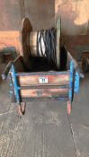 Wooden barrow with qty of wire on reel