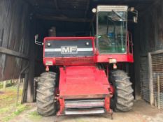 1979 Massey Ferguson 750 combine harvester with 14ft header and trolley. The combine benefits from a