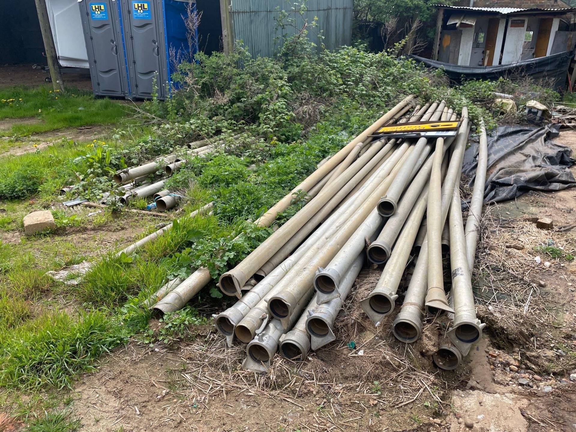 Quantity misc irrigation pipes (located in yard)