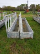 Quantity of cattle feed barriers with troughs