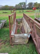Wooden feed barrier with trough