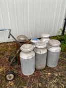 6 milk churns and trolley