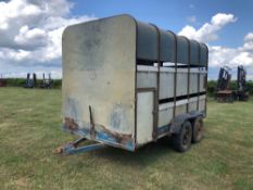 Twin axle livestock trailer with towing eye